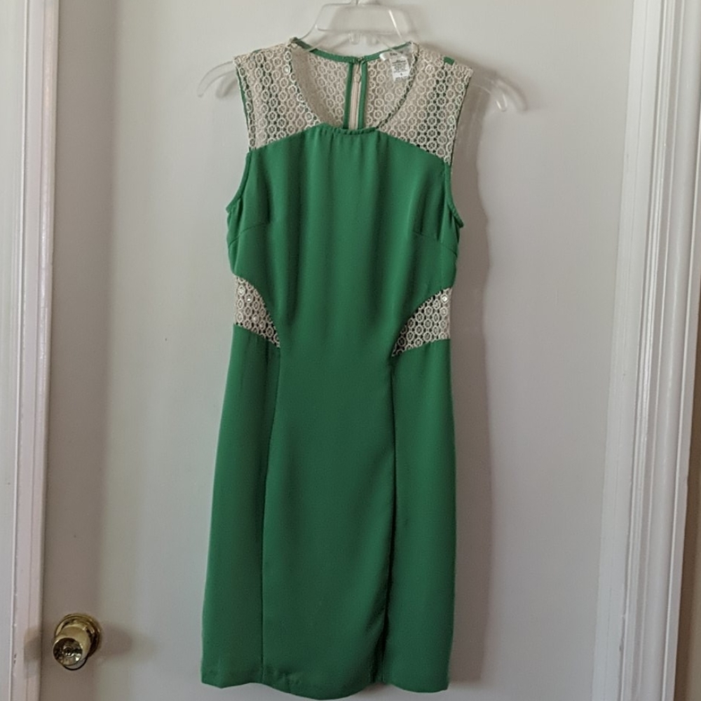 Esley green cocktail dress with lace cutouts